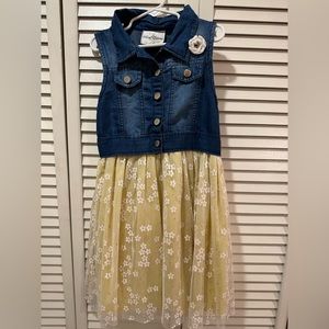 Girl’s blue sleeveless denim bodice with yellow white floral skirt dress